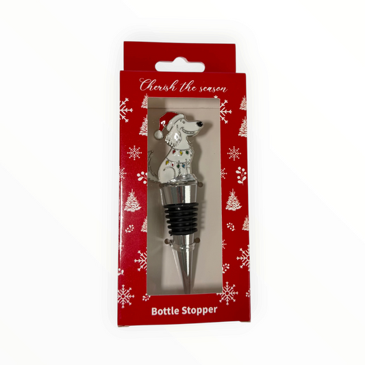 CE Collection Christmas bottle stopper featuring a white dog wearing a Santa hat and string lights in red packaging