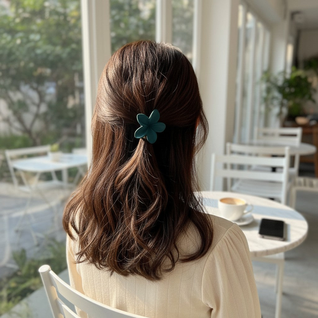 CE Collection 12 pack of flower-shaped hair clips in assorted matte colors: green, teal, dusty rose, grey, and brown.