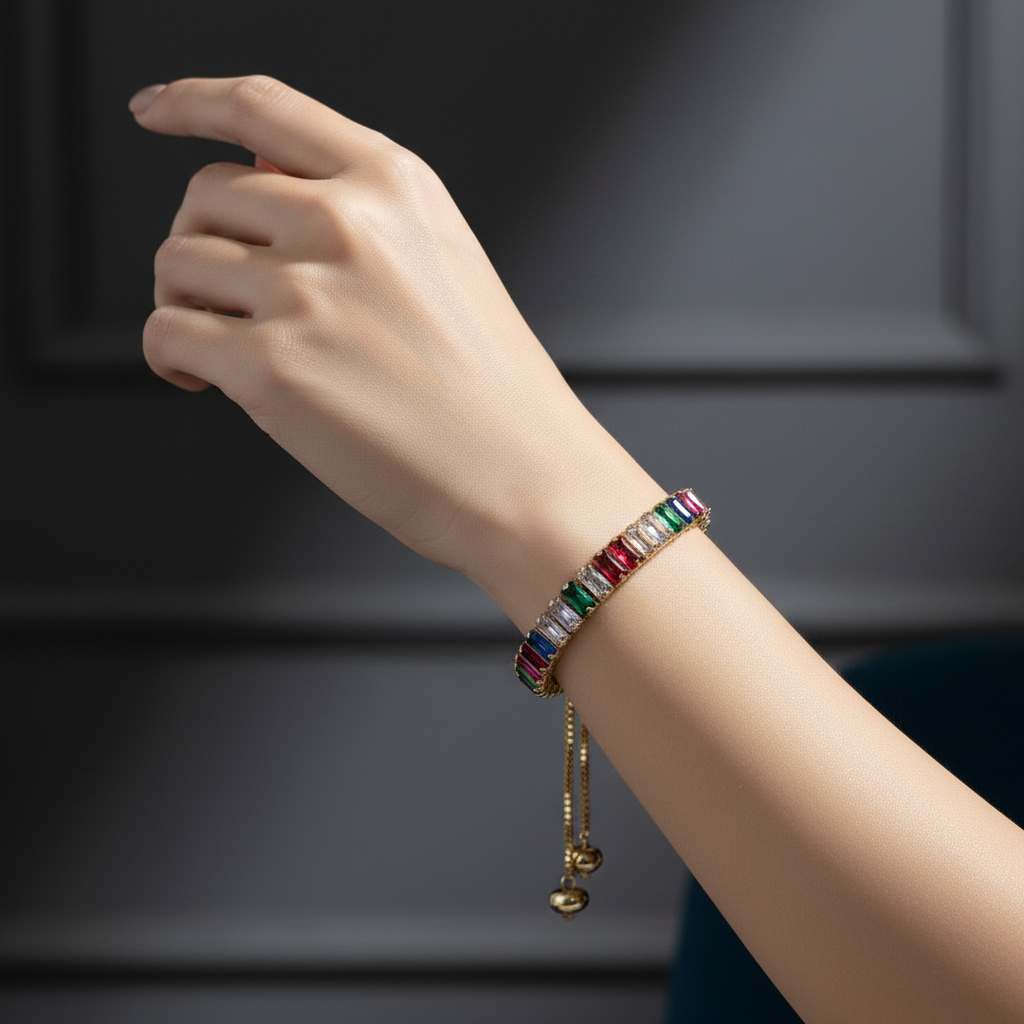 CE Collection gold plated bracelet featuring vibrant multicoloured baguette-cut stones on a delicate adjustable chain